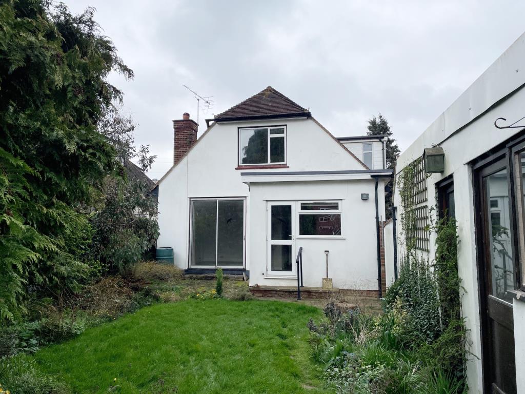 Lot: 63 - A DETACHED THREE-BEDROOM HOUSE SITUATED IN A POPULAR LOCATION FOR IMPROVEMENT - rear view of the property